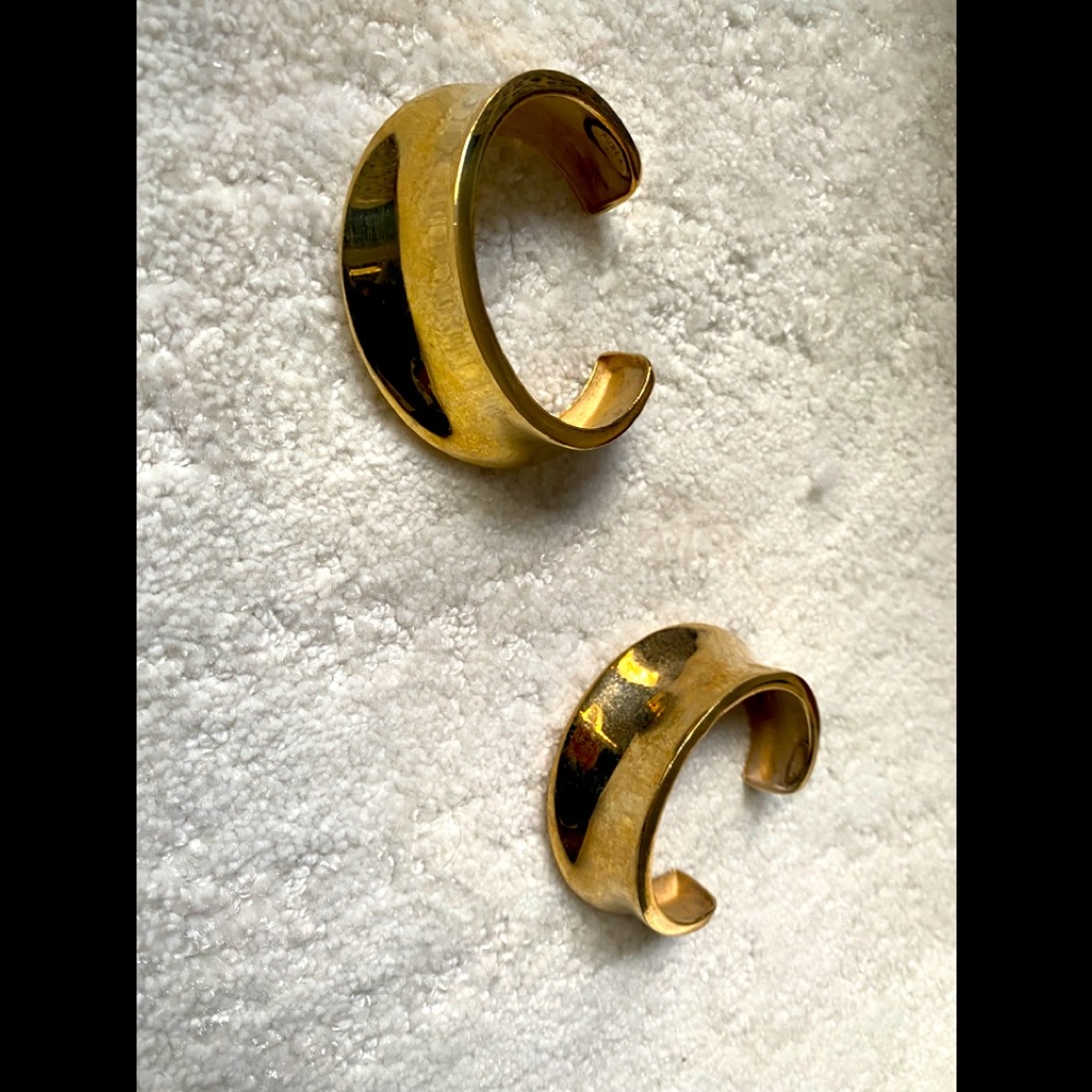 Pair Furla Cuffs. Gold metal. Both stamped.